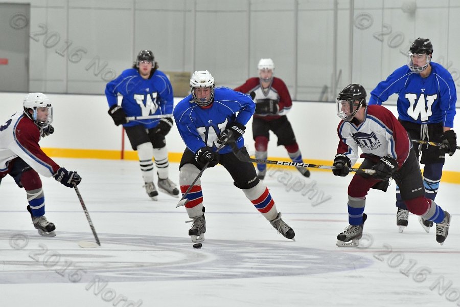 Wheaton College Men\'s Ice Hockey vs Middlesex Community College. - Photo By: KEITH NORDSTROM